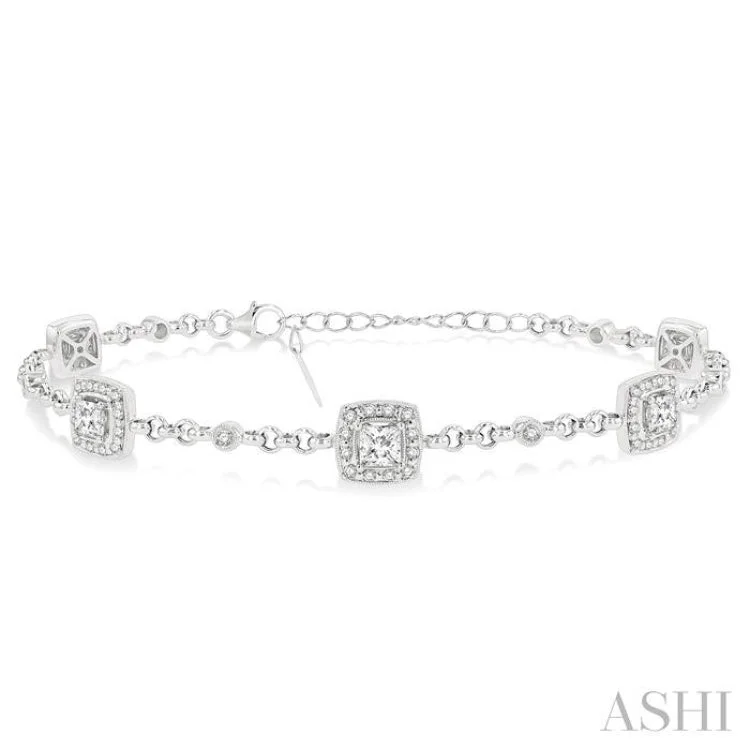 2 1/10 ctw Round and Princess Cut Diamond Bracelet in 18K White Gold