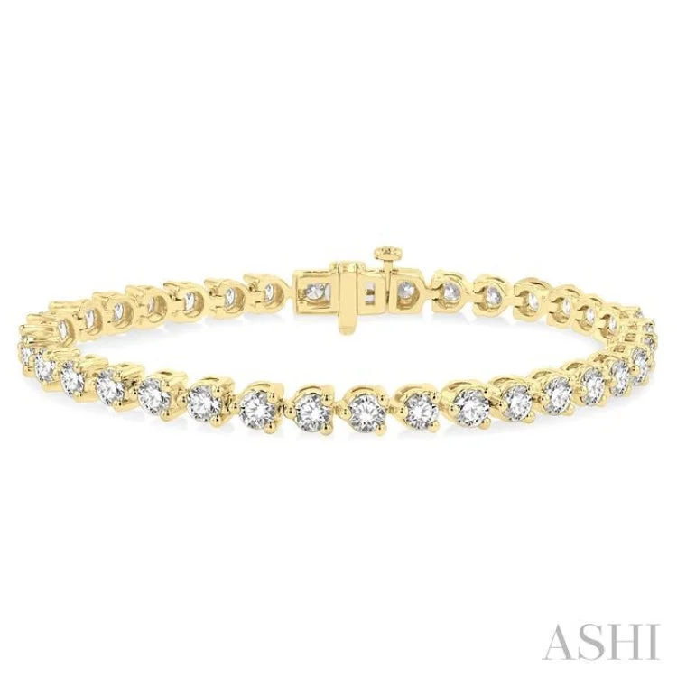 7 Ctw Tri-Prong Round Cut Diamond Bracelet in 14K Yellow Gold