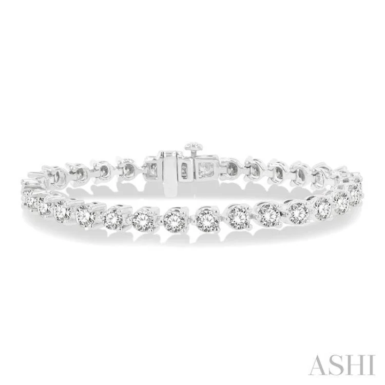 10.00CT RDDM 3 PRONG BRACELET WG 14K-G*